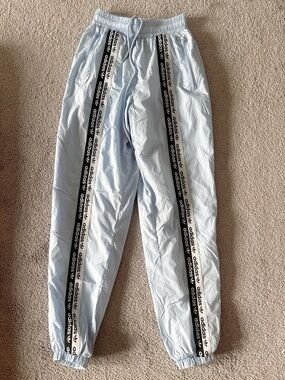 adidas Pale Blue Track Pants with Black Logo Tape